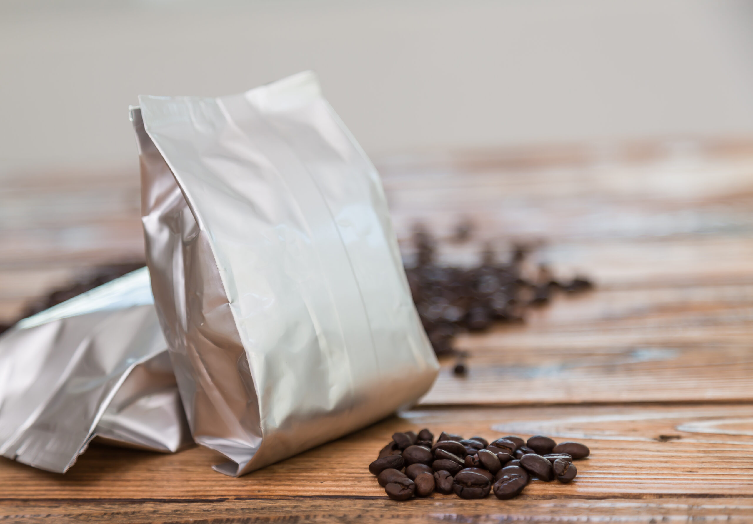 New coffee foil bag on wood table